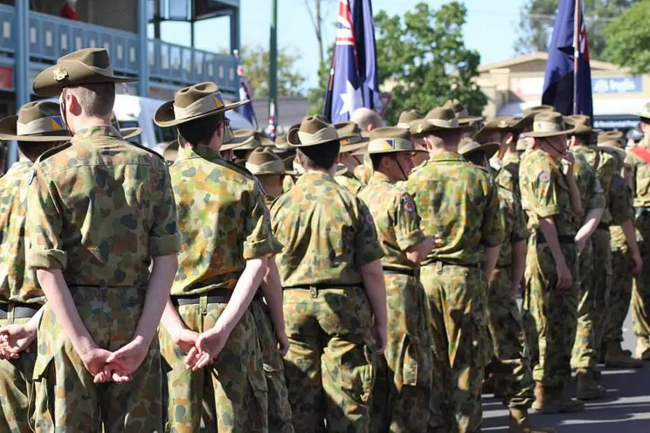 Australian soldiers stand and wait for Anzac parade