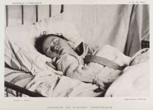 Female patient in straight jacket