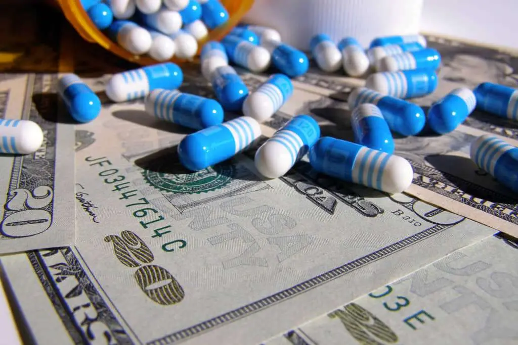 Image showing drugs and dollars