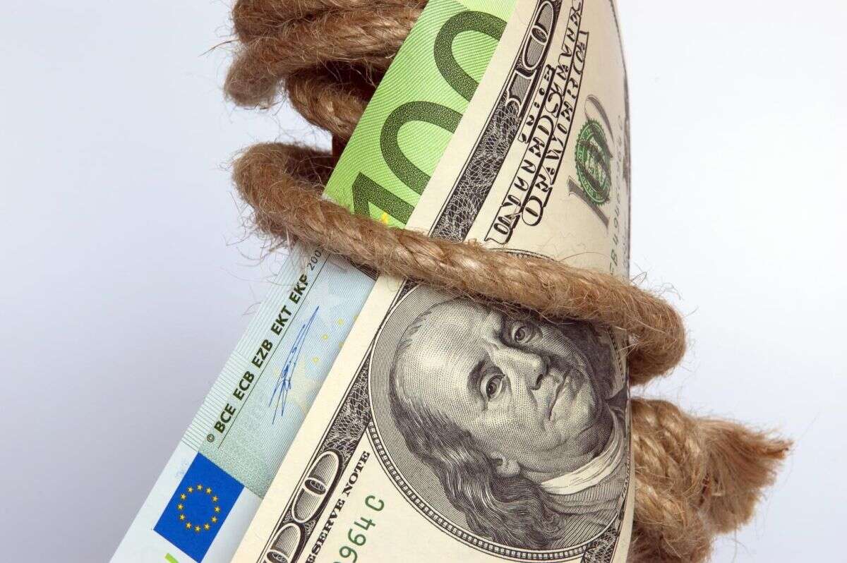 Money tied up with rope